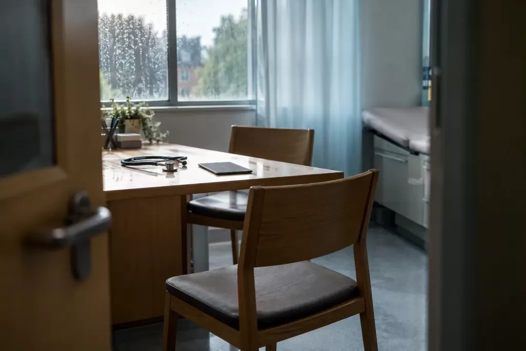 Empty consultation room for fictional MHRA AI healthcare public views 2026 editorial photograph