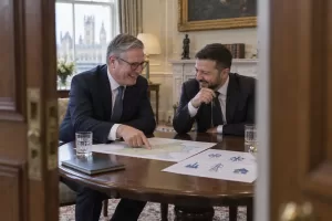 Two laughing diplomats at a fictional PM Zelenskyy meeting Yerevan 2026
