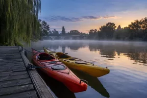 Empty riverside kayaks for fictional Wargrave sprint triathlon river restriction 2026 editorial photograph